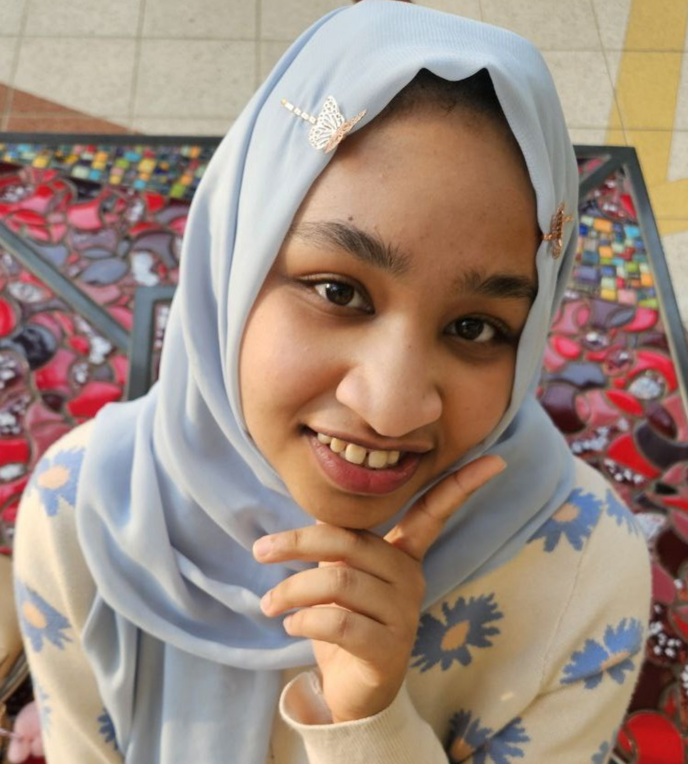 Friendly hijabi girl (Yumna) smiling at the viewer